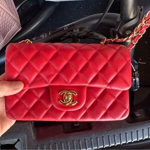 Beautiful red w/ gold Chanel purse. Flawless